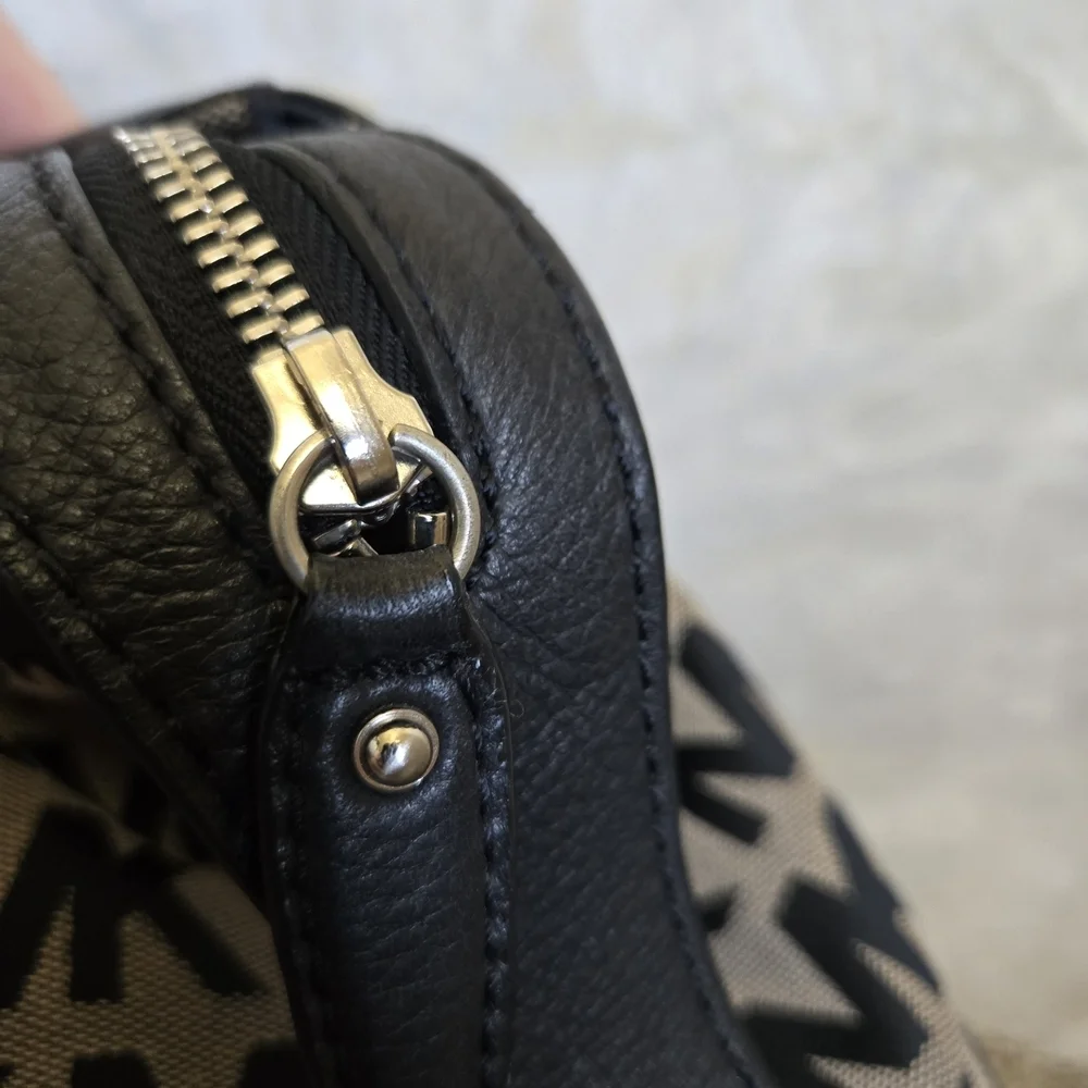 Michael Kors Black and Tan Shoulder Bag with Classic Design